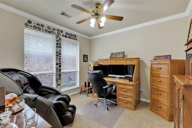 office area featuring crown molding, light carpet, a ceiling fan, and visible vents