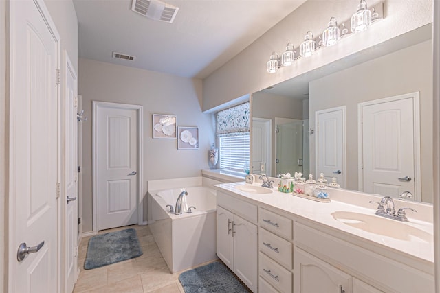 bathroom with a shower stall, a garden tub, a sink, and visible vents
