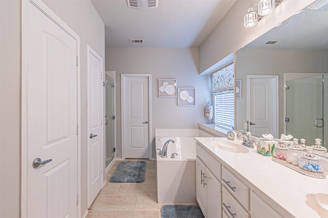 bathroom with a bath, a shower stall, visible vents, and a sink