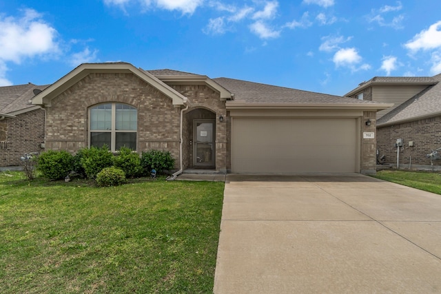702 Grassland Way, Arlington, TX 76002 - ranch-style house with a garage, driveway, brick siding, and a front lawn