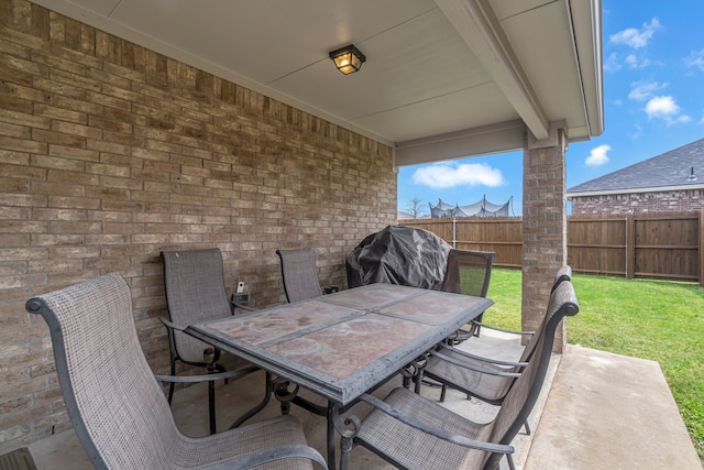 702 Grassland Way, Arlington, TX 76002 - view of patio / terrace with outdoor dining space and a grill