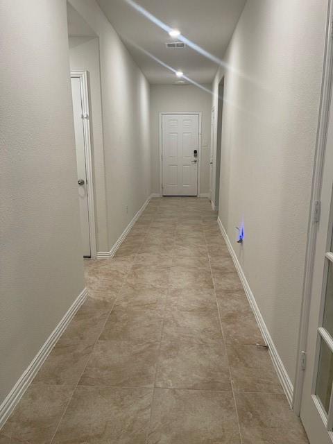702 Grassland Way, Arlington, TX 76002 - corridor with baseboards