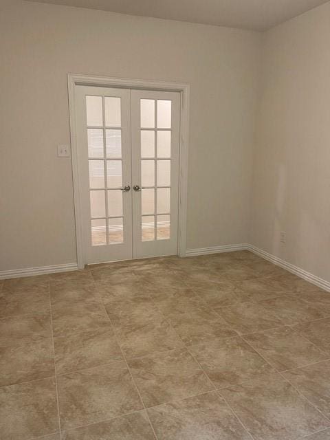 702 Grassland Way, Arlington, TX 76002 - unfurnished room featuring french doors and baseboards