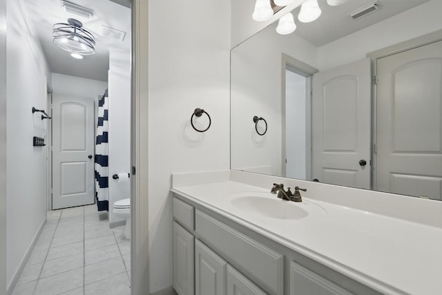 2204 Chipping Campden Rd, Denton, TX 76226 - bathroom featuring toilet, vanity, tile patterned flooring, baseboards, and a shower with shower curtain