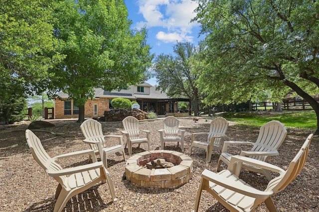 view of patio / terrace with an outdoor fire pit