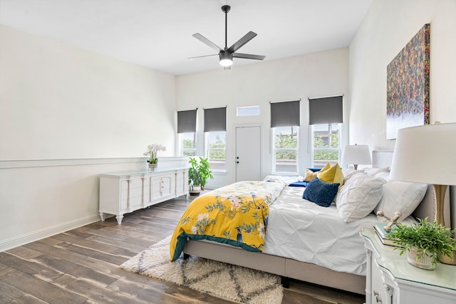 1823 S Ervay St, Dallas, TX 75215 - bedroom featuring wood finished floors, baseboards, and a ceiling fan