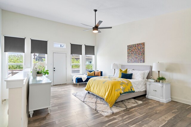 1823 S Ervay St, Dallas, TX 75215 - bedroom featuring multiple windows, wood finished floors, and baseboards