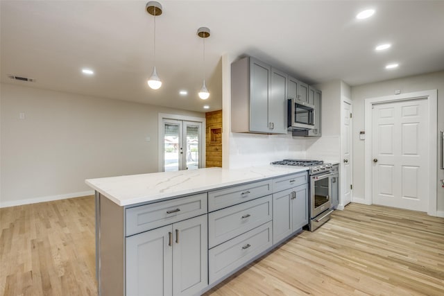 8494 Swift Ave, Dallas, TX 75228 - kitchen with appliances with stainless steel finishes, gray cabinets, light wood-style floors, and recessed lighting