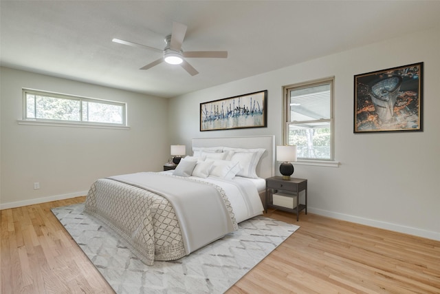 8494 Swift Ave, Dallas, TX 75228 - bedroom featuring wood finished floors, baseboards, and a ceiling fan