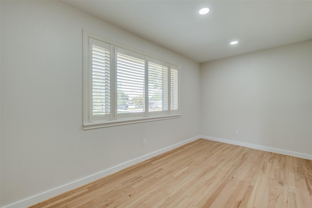 8494 Swift Ave, Dallas, TX 75228 - empty room with baseboards, wood finished floors, and recessed lighting