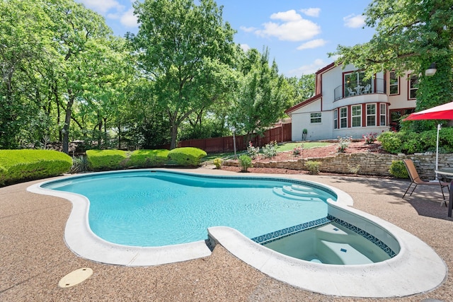 2013 Florence Rd, Keller, TX 76262 - view of swimming pool featuring a pool with connected hot tub and a patio area