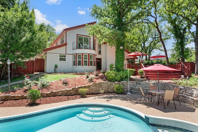 2013 Florence Rd, Keller, TX 76262 - back of house featuring a fenced backyard, a patio area, stucco siding, and a wooden deck