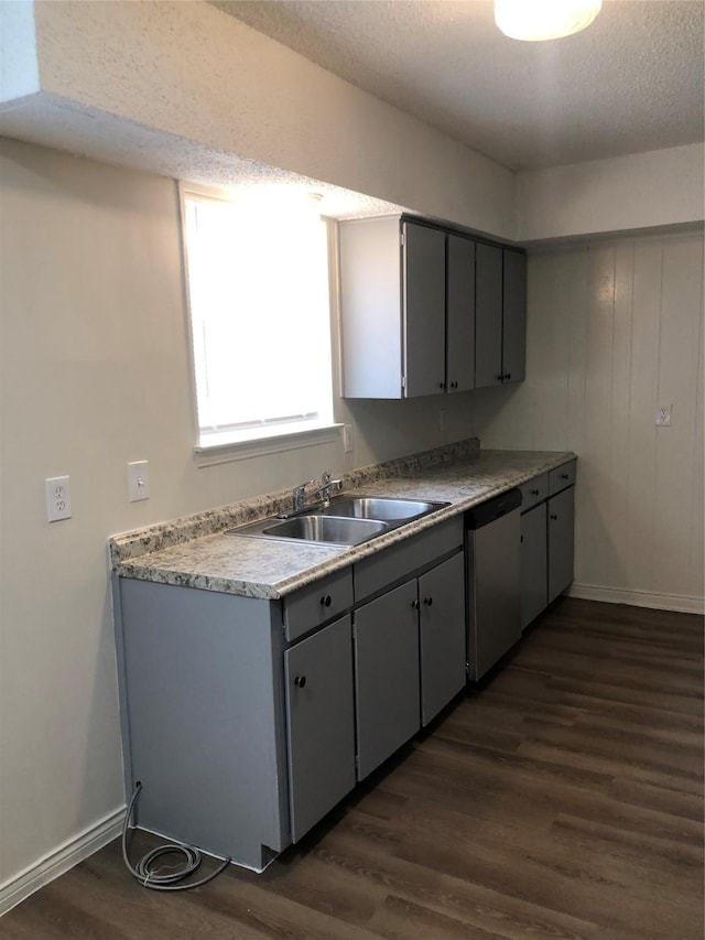 414 Brookview Dr, Desoto, TX 75115 - kitchen with baseboards, dishwasher, dark wood-style floors, and a sink