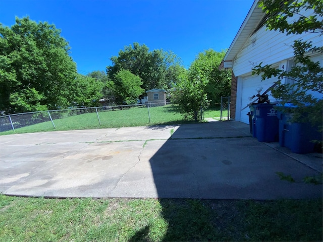 414 Brookview Dr, Desoto, TX 75115 - view of patio / terrace with driveway, fence, and a garage