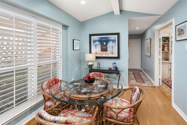 dining area with lofted ceiling with beams, baseboards, recessed lighting, and light wood-style floors