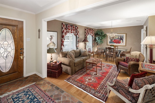 living area featuring baseboards, a chandelier, and ornamental molding