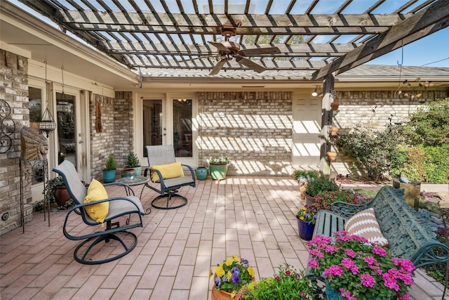 view of patio featuring a pergola and ceiling fan