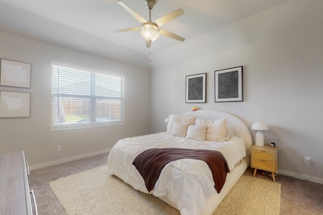 bedroom with baseboards, carpet flooring, and ceiling fan