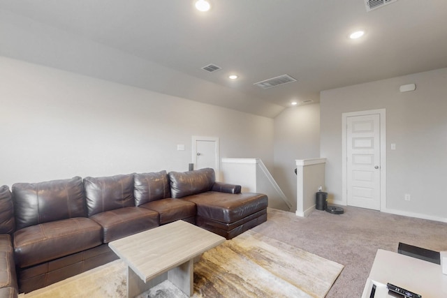 carpeted living room featuring vaulted ceiling, baseboards, visible vents, and recessed lighting