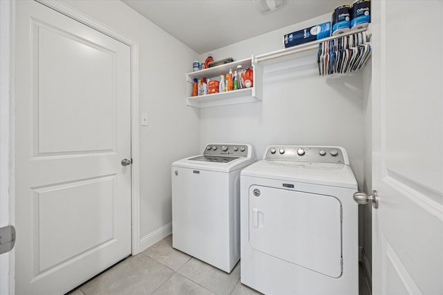 511 Ranchwood Dr, Justin, TX 76247 - washroom featuring separate washer and dryer, light tile patterned floors, and baseboards
