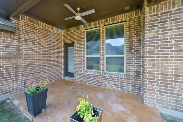 view of patio with a ceiling fan