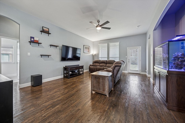 511 Ranchwood Dr, Justin, TX 76247 - living room with a ceiling fan, healthy amount of natural light, wood finished floors, and baseboards