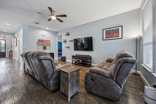 511 Ranchwood Dr, Justin, TX 76247 - living room featuring arched walkways, ceiling fan, dark wood-style flooring, baseboards, and recessed lighting