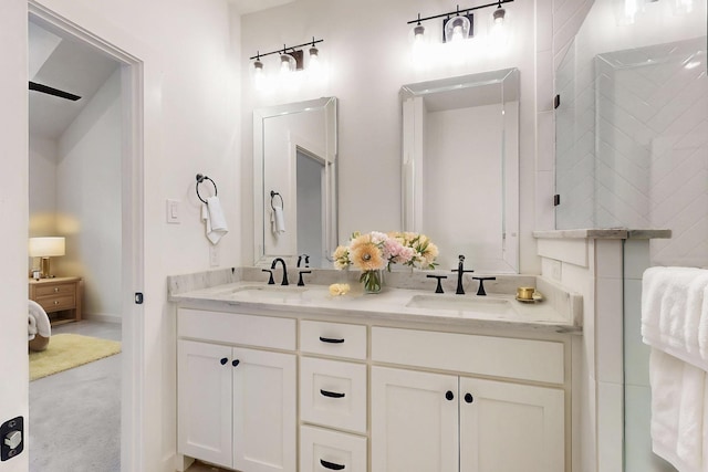 full bath featuring double vanity and a sink