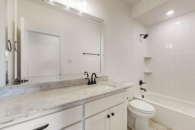 full bath featuring shower / washtub combination, vanity, and toilet