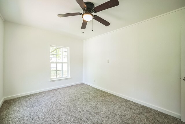 2126 Cedar St, Paris, TX 75460 - empty room with baseboards, carpet, and ceiling fan