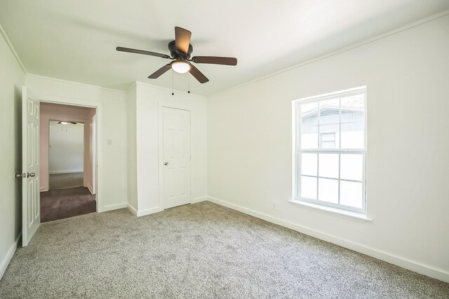 2126 Cedar St, Paris, TX 75460 - unfurnished bedroom featuring baseboards, carpet, ceiling fan, and crown molding