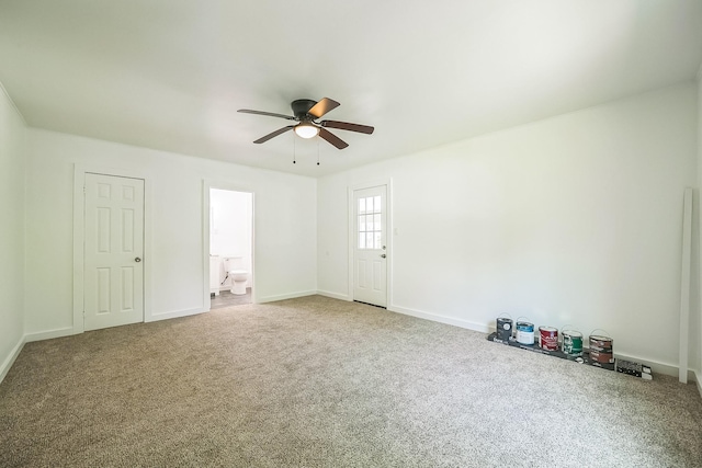2126 Cedar St, Paris, TX 75460 - carpeted spare room with baseboards and ceiling fan