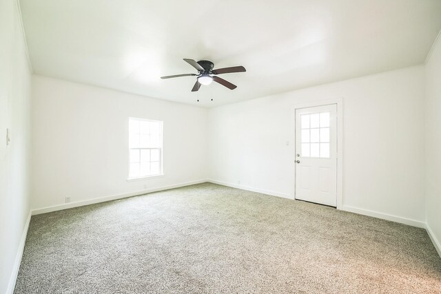 2126 Cedar St, Paris, TX 75460 - spare room with ceiling fan, baseboards, and carpet flooring