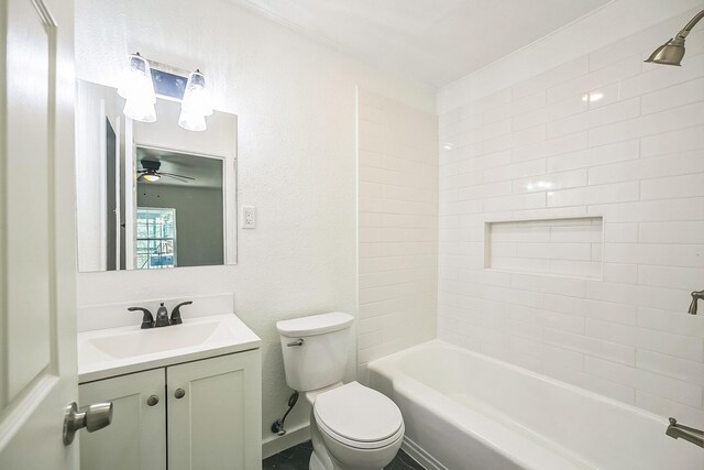 2126 Cedar St, Paris, TX 75460 - bathroom featuring bathtub / shower combination, toilet, vanity, and a ceiling fan