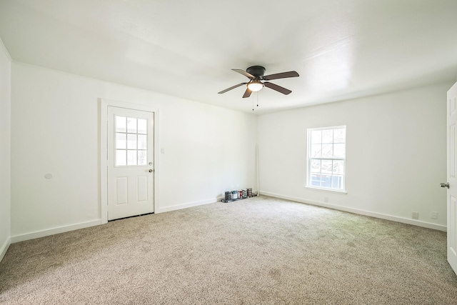 2126 Cedar St, Paris, TX 75460 - carpeted spare room featuring baseboards and ceiling fan