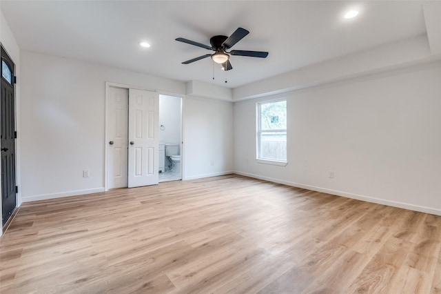 604 N E St, Arlington, TX 76011 - unfurnished bedroom featuring light wood-style flooring, baseboards, recessed lighting, ceiling fan, and connected bathroom