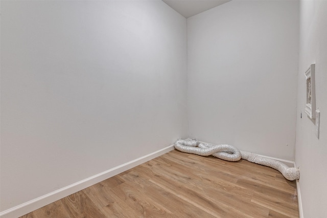 604 N E St, Arlington, TX 76011 - empty room with light wood finished floors and baseboards