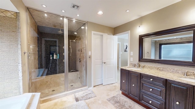 1351 Porter Ct, Granbury, TX 76048 - bathroom featuring visible vents, a sink, and a shower stall