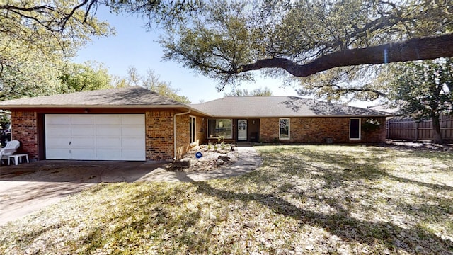 1351 Porter Ct, Granbury, TX 76048 - ranch-style home with fence, concrete driveway, brick siding, and a garage