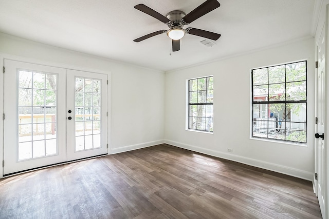 doorway featuring dark wood-type flooring, crown molding, and french doors