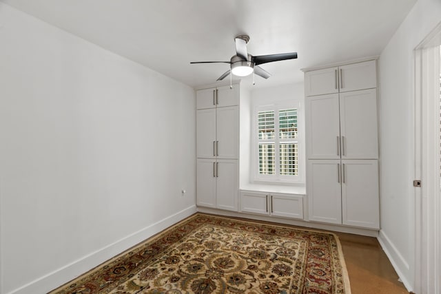 1413 S Waverly Dr, Dallas, TX 75208 - unfurnished bedroom featuring baseboards and a ceiling fan