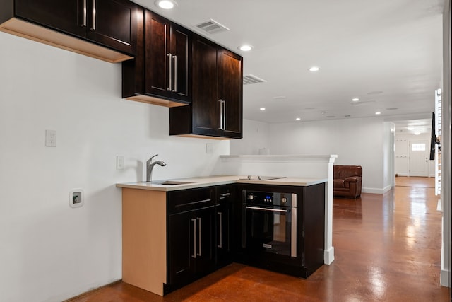 1413 S Waverly Dr, Dallas, TX 75208 - kitchen featuring a peninsula, visible vents, oven, and recessed lighting