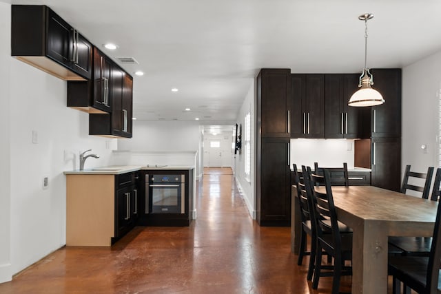 1413 S Waverly Dr, Dallas, TX 75208 - kitchen with recessed lighting, a sink, black oven, and finished concrete flooring
