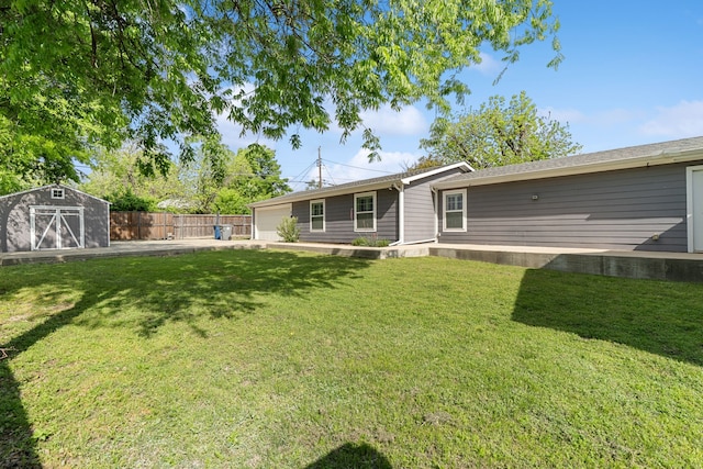 1413 S Waverly Dr, Dallas, TX 75208 - back of property with fence, a storage shed, an attached garage, an outdoor structure, and a lawn