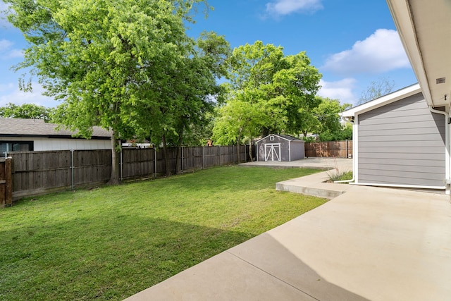 1413 S Waverly Dr, Dallas, TX 75208 - view of yard featuring an outbuilding, a fenced backyard, a shed, and a patio