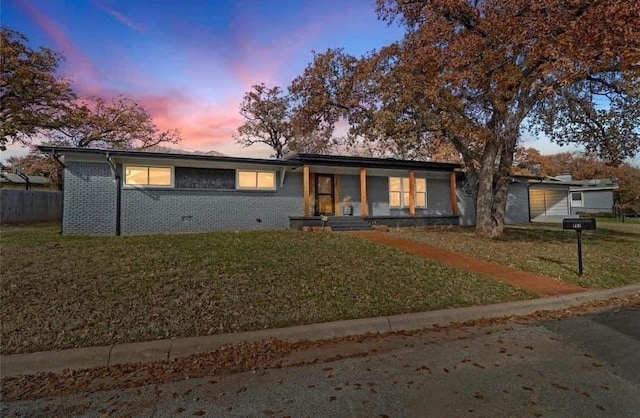 mid-century inspired home featuring a yard