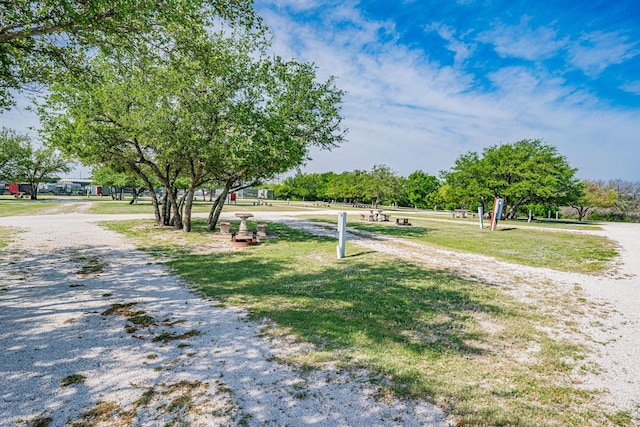 surrounding community with a lawn