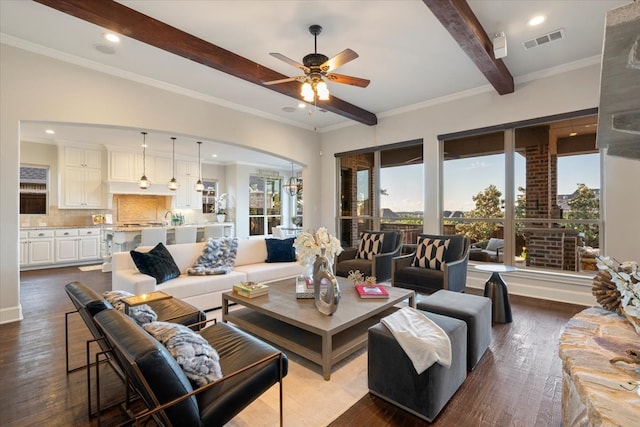 living room with beam ceiling, ceiling fan, dark wood finished floors, arched walkways, and recessed lighting