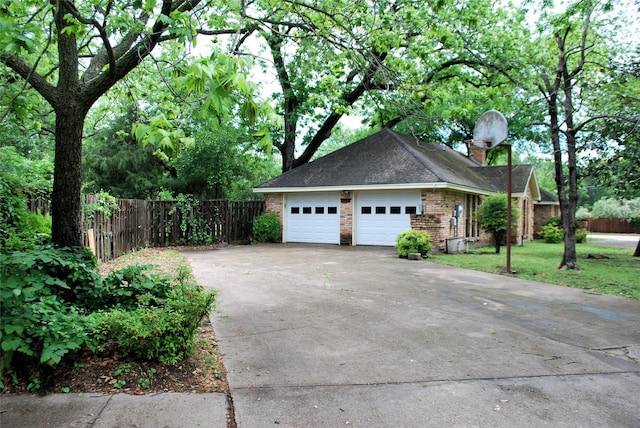 garage featuring fence