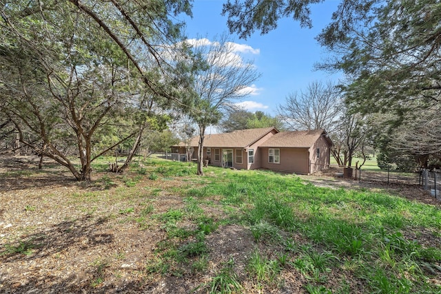 view of yard featuring fence
